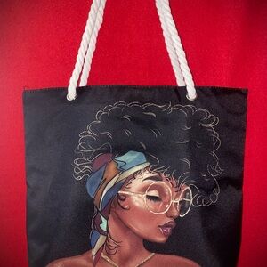 Stylish Black Tote Bag with Artistic Design